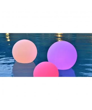 Floating glowing ball with overflowing colors - red, blue, green | Point Point